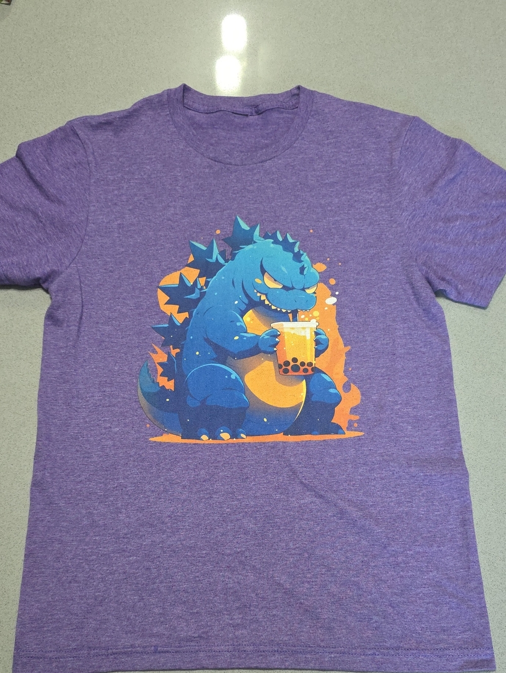 Purple Kids Graphic Tee with Blue Monster Bubble Tea Design